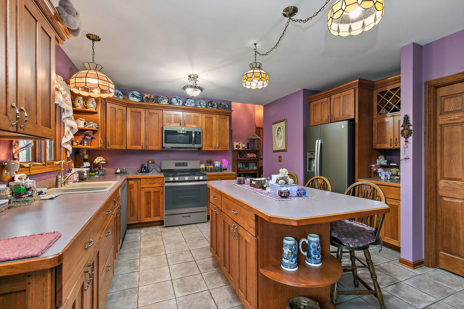 14N700 Factly Road Sycamore, IL 60178 - Photo 51 of 73 a kitchen with a sink stove and refrigerator