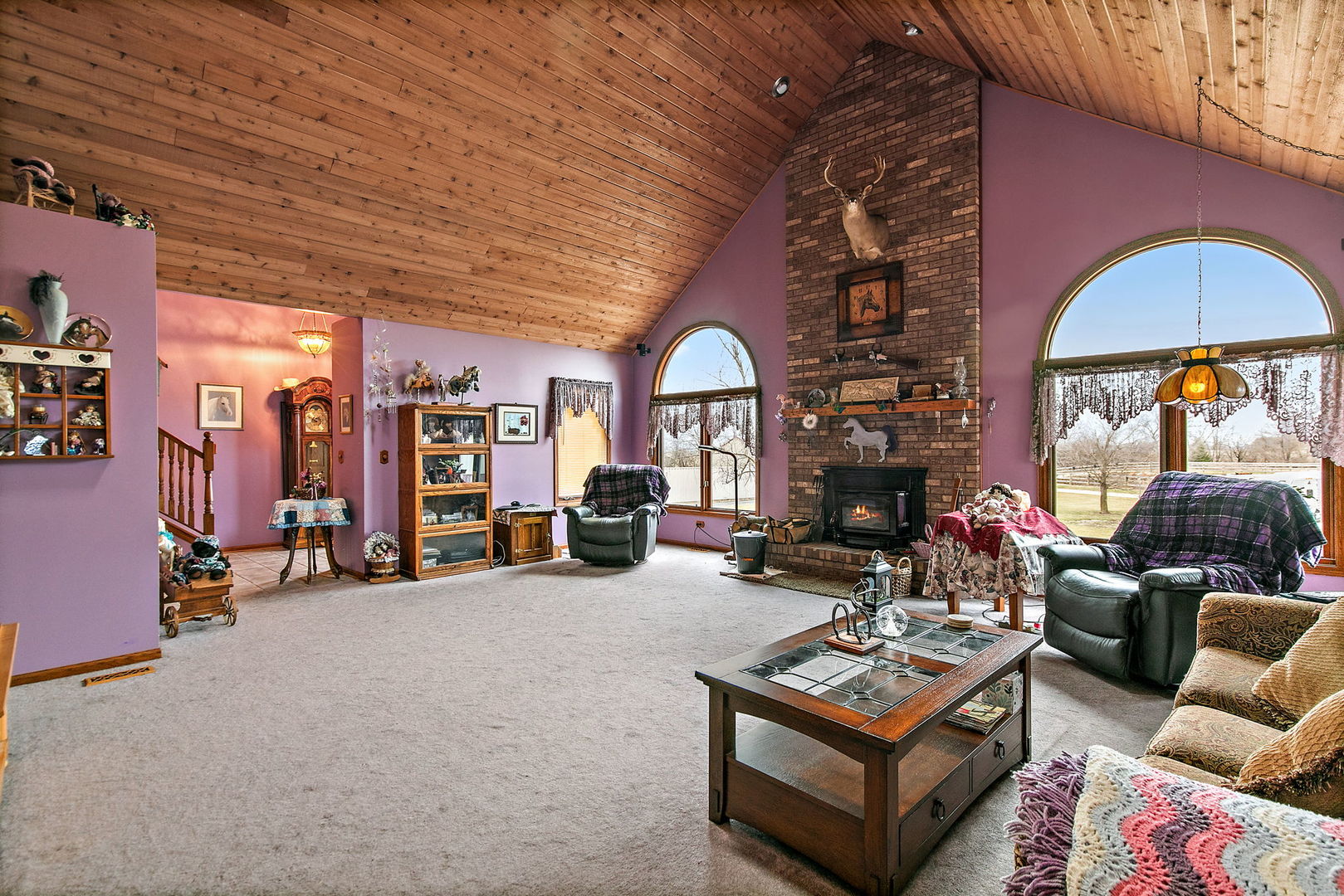 14N700 Factly Road Sycamore, IL 60178 - Photo 54 of 73 a living room with furniture a fireplace and a large window