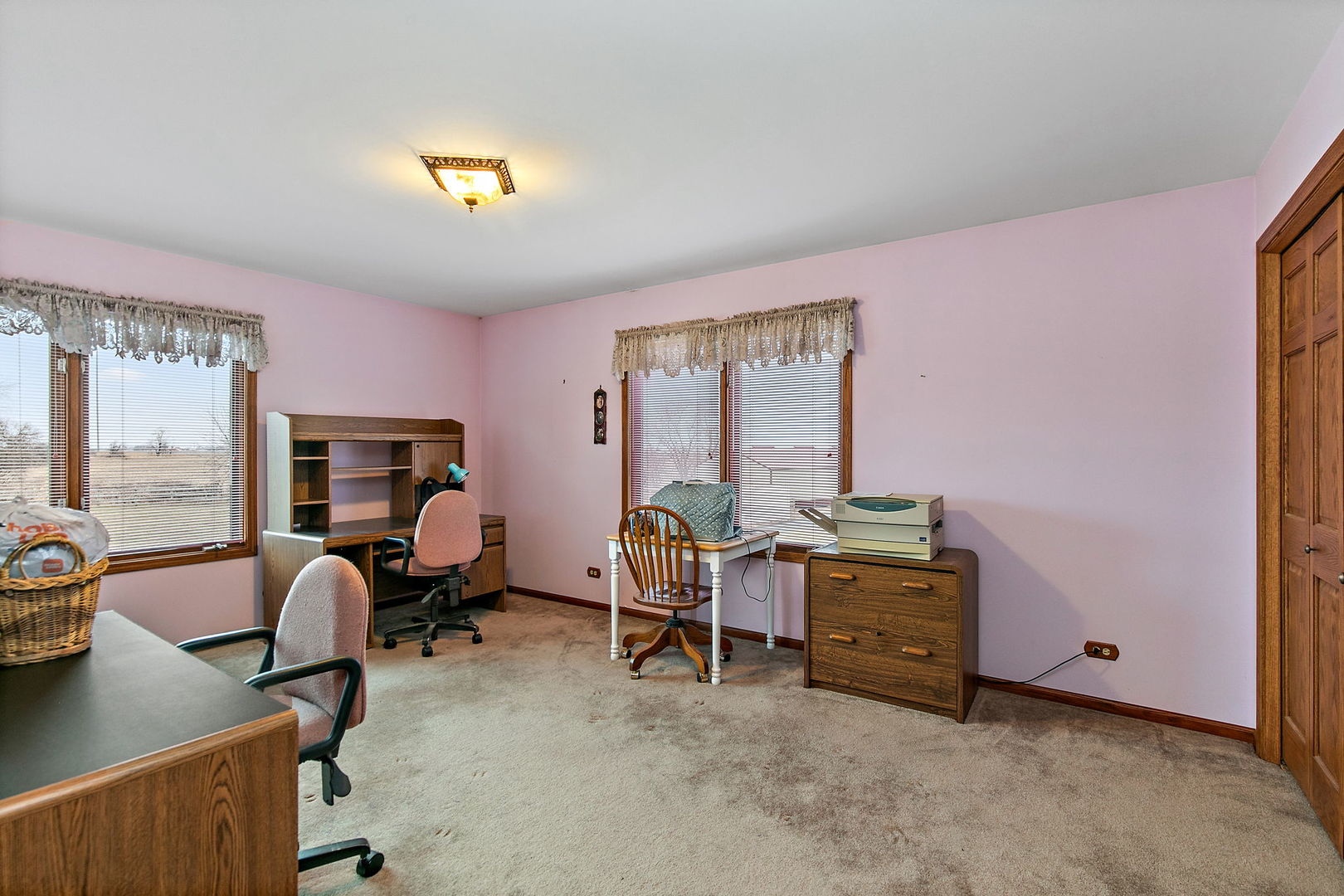 14N700 Factly Road Sycamore, IL 60178 - Photo 62 of 73 a view of a workspace with furniture and a window
