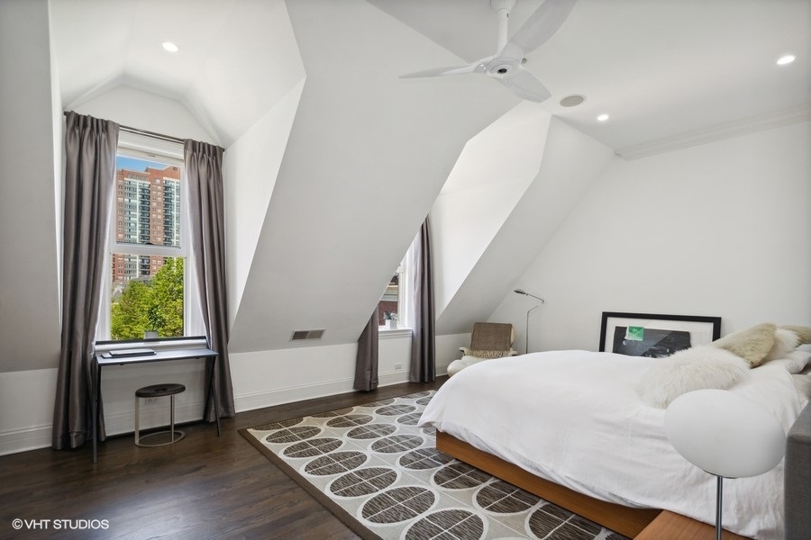 1919 South Prairie Avenue, Unit 5 Chicago, IL 60616 - Photo 13 of 19 a bedroom with a bed and a window
