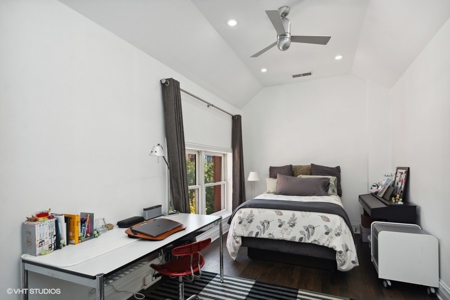 1919 South Prairie Avenue, Unit 5 Chicago, IL 60616 - Photo 17 of 19 a bedroom with a bed and a desk