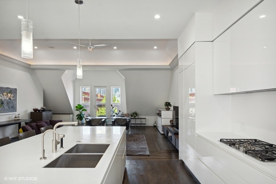 1919 South Prairie Avenue, Unit 5 Chicago, IL 60616 - Photo 10 of 19 a kitchen with a sink and a stove top oven