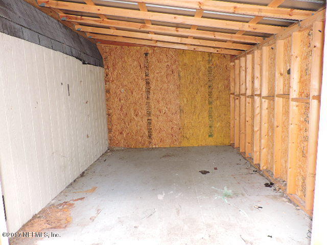 4330 Bondarenko Road Keystone Heights, FL 32656 - Photo 18 of 56 Storage room in Barn