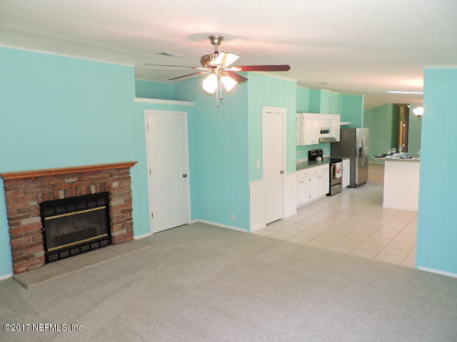 4330 Bondarenko Road Keystone Heights, FL 32656 - Photo 34 of 56 Family Room to Kitchen
