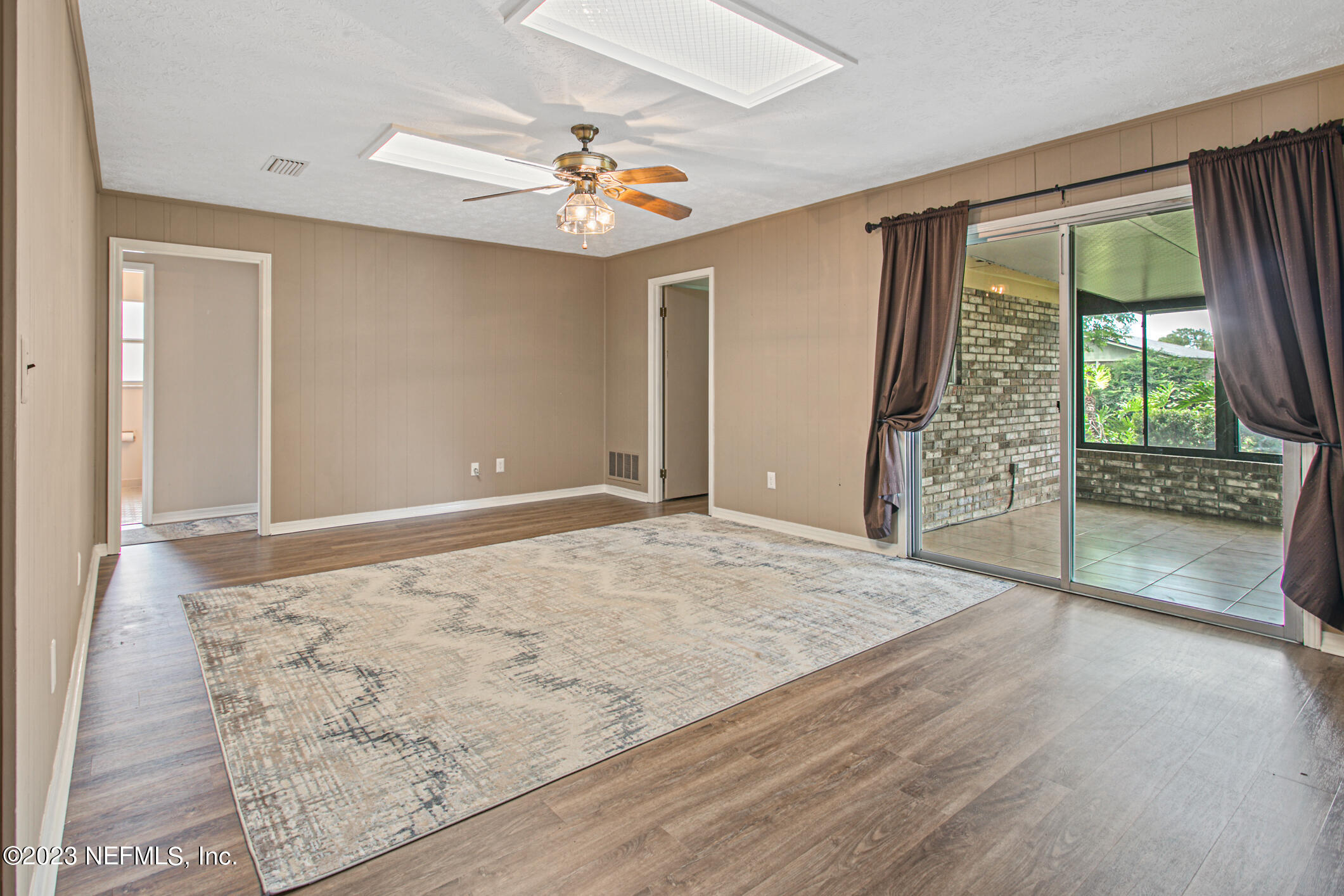 71 Vanderford Road East Orange Park, FL 32073 - Photo 19 of 52 a view of an empty room with a window