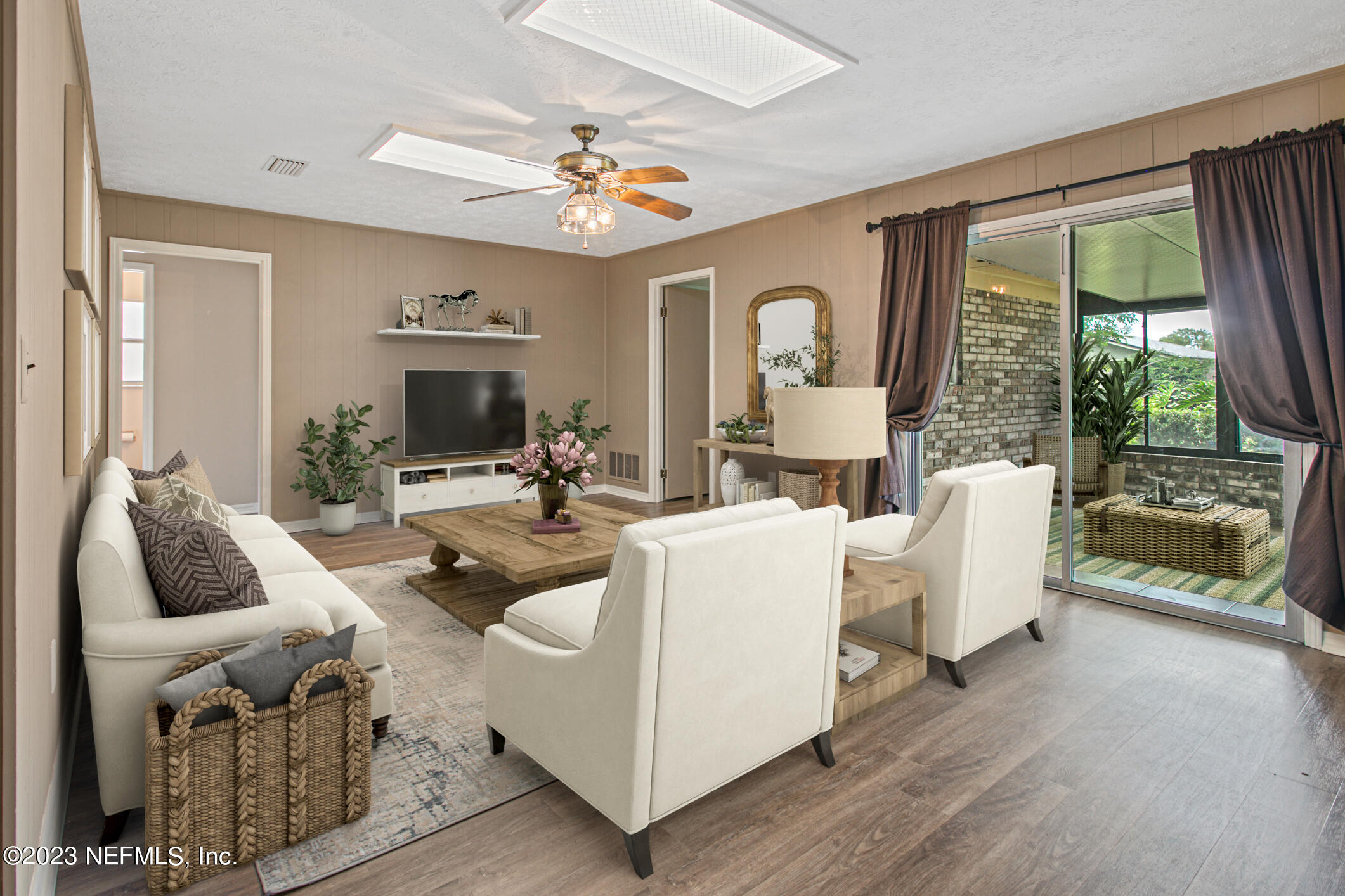 71 Vanderford Road East Orange Park, FL 32073 - Photo 20 of 52 a living room with furniture and large windows