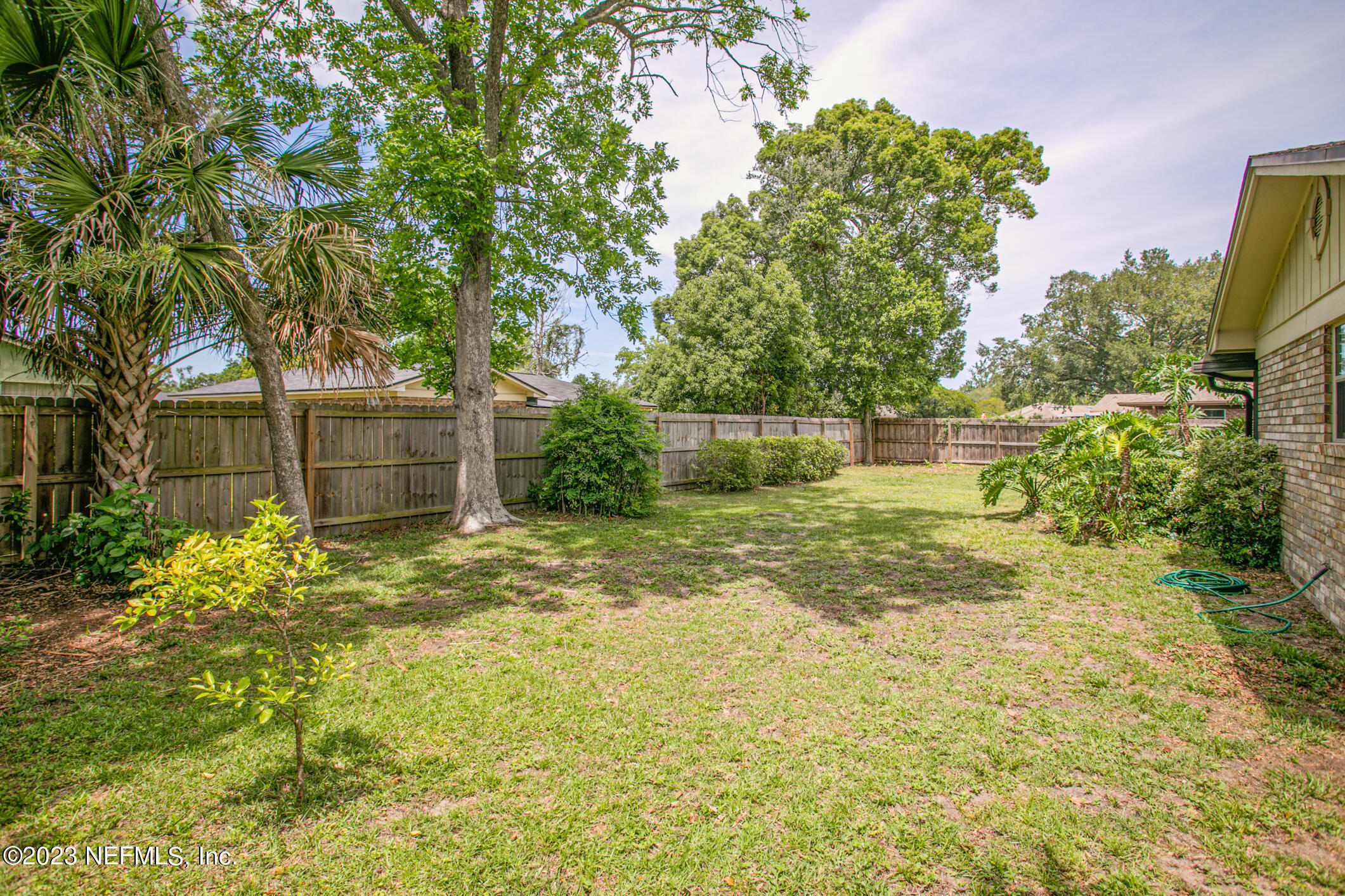 71 Vanderford Road East Orange Park, FL 32073 - Photo 37 of 52 a backyard of a house with lots of green space