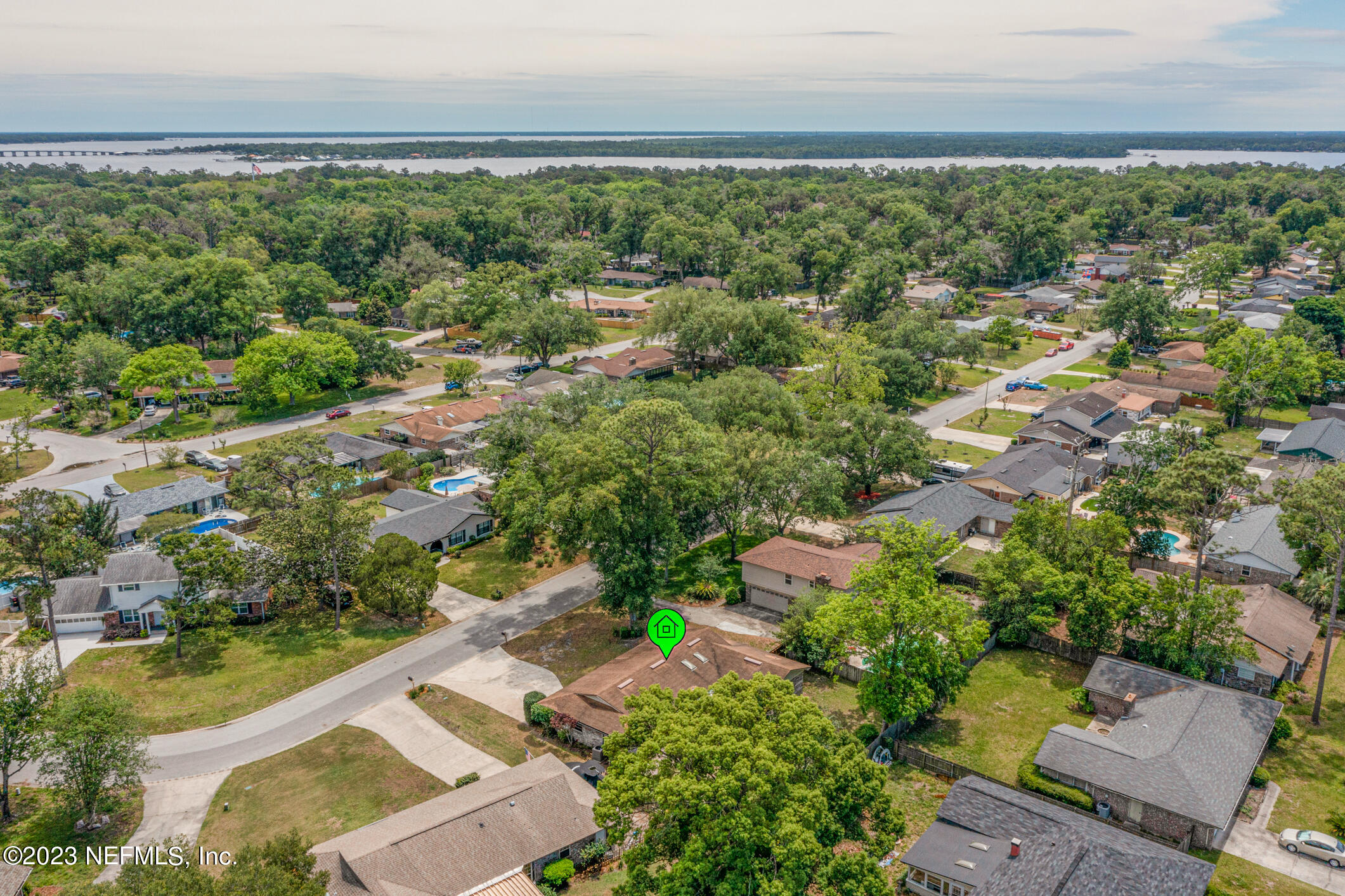 71 Vanderford Road East Orange Park, FL 32073 - Photo 39 of 52 an aerial view of residential houses with outdoor space and trees all around