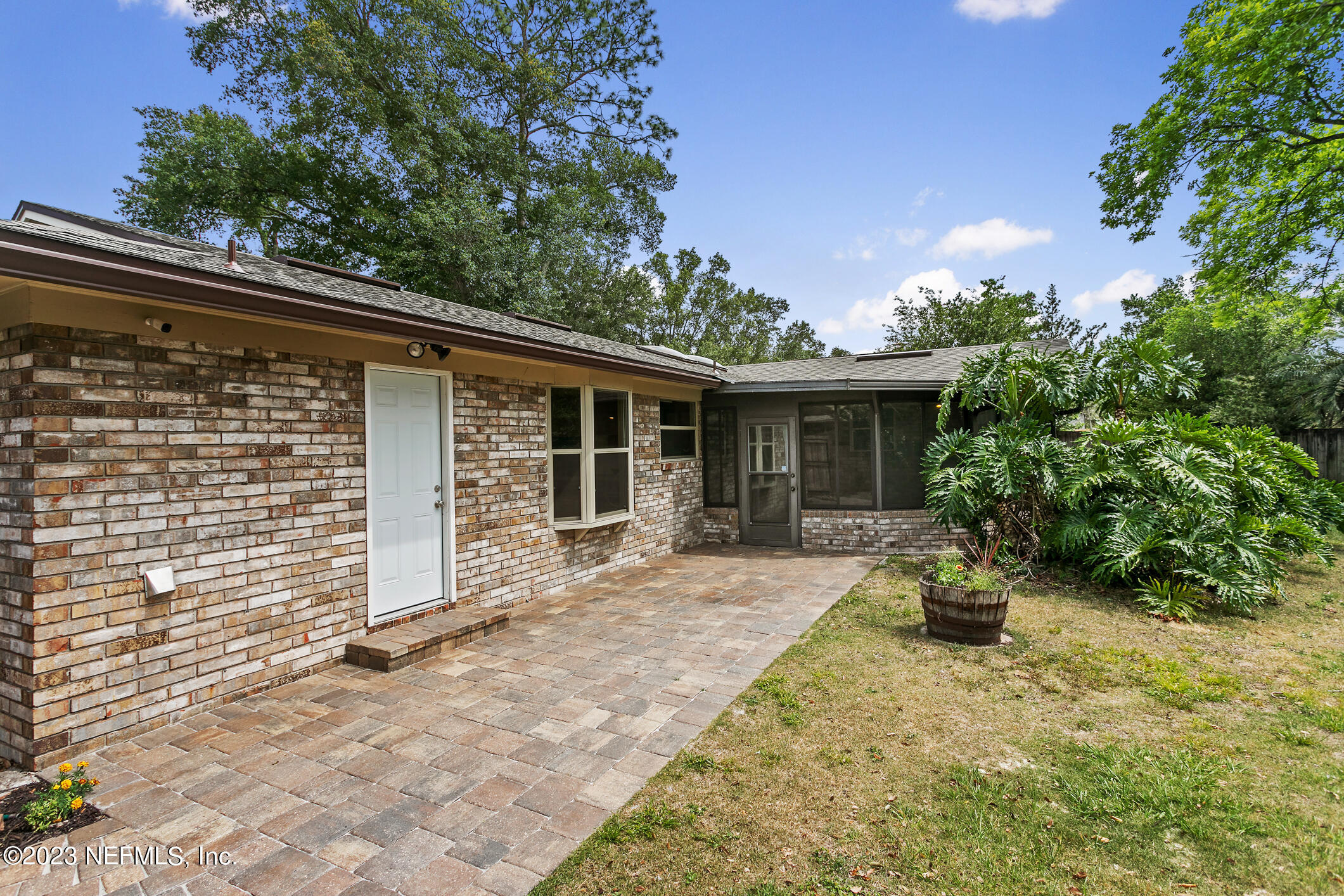 71 Vanderford Road East Orange Park, FL 32073 - Photo 43 of 52 a front view of a house with garden
