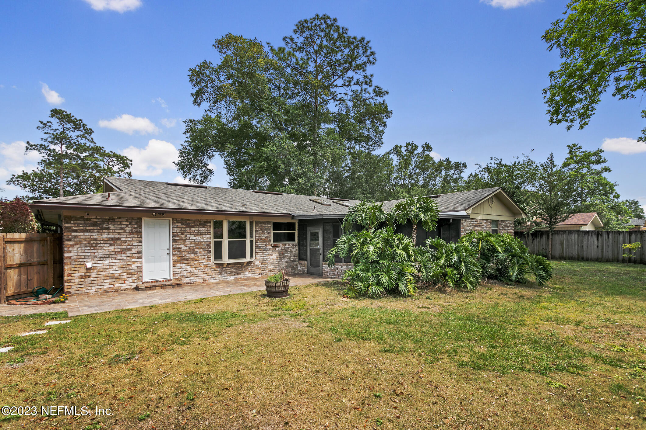 71 Vanderford Road East Orange Park, FL 32073 - Photo 44 of 52 a front view of a house with garden