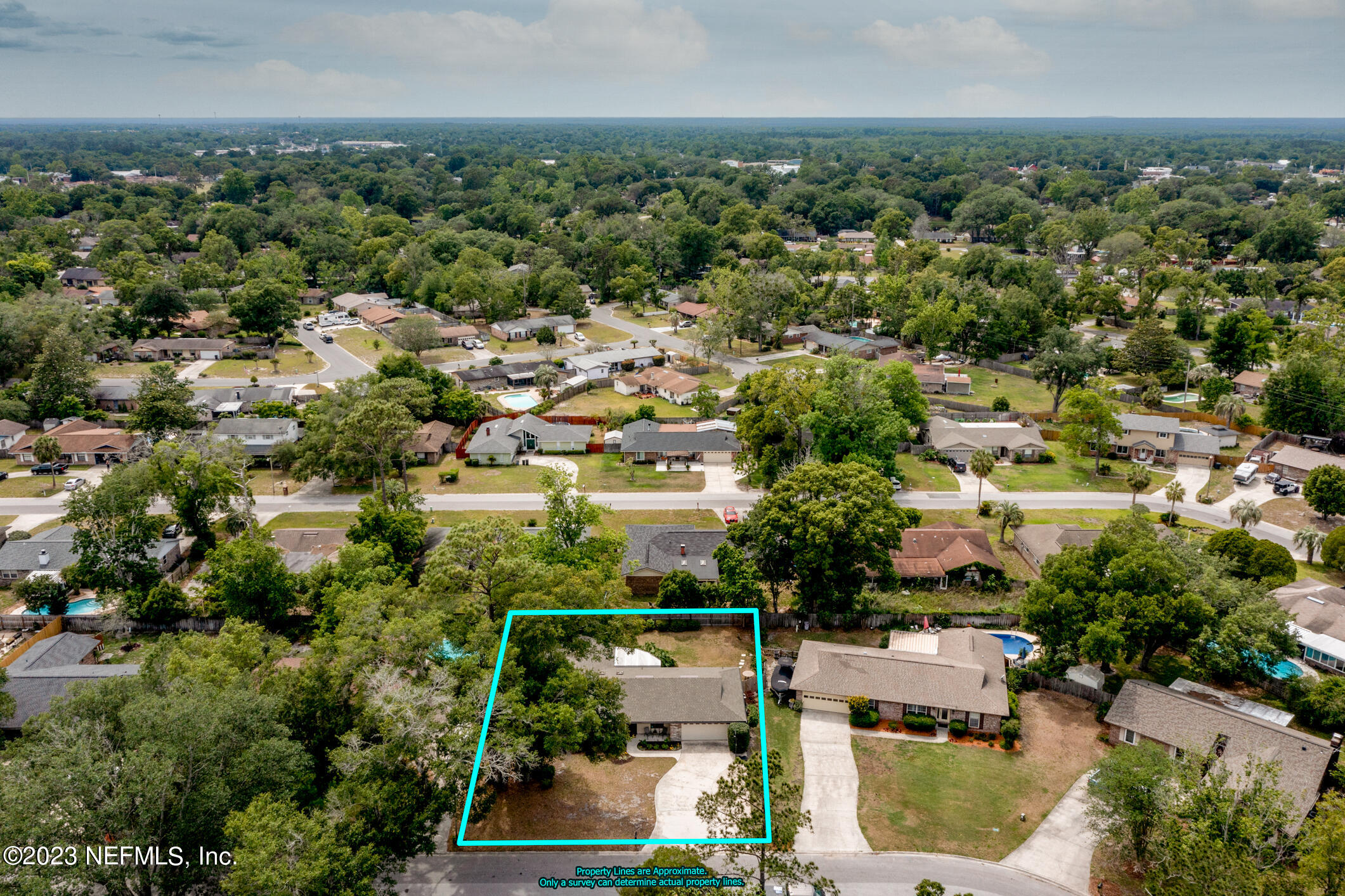 71 Vanderford Road East Orange Park, FL 32073 - Photo 49 of 52 an aerial view of residential houses with outdoor space and trees all around