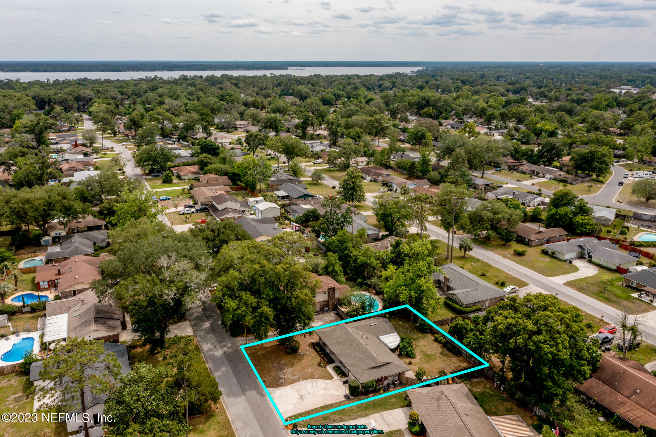 71 Vanderford Road East Orange Park, FL 32073 - Photo 50 of 52 an aerial view of a house with a yard