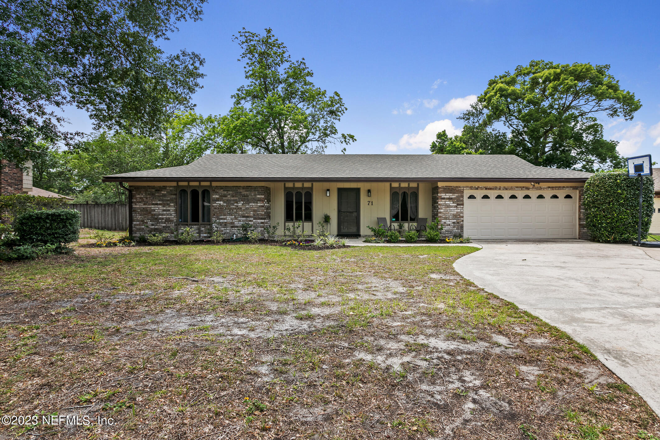 71 Vanderford Road East Orange Park, FL 32073 - Photo 52 of 52 a front view of a house with a yard