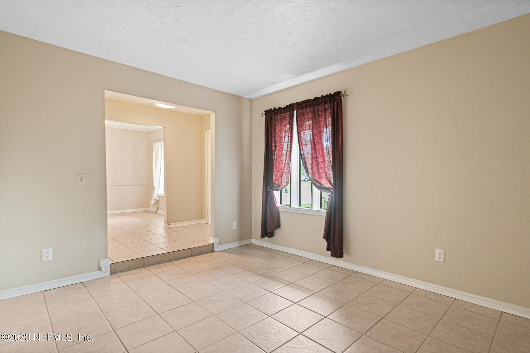 71 Vanderford Road East Orange Park, FL 32073 - Photo 7 of 52 a view of an empty room and window