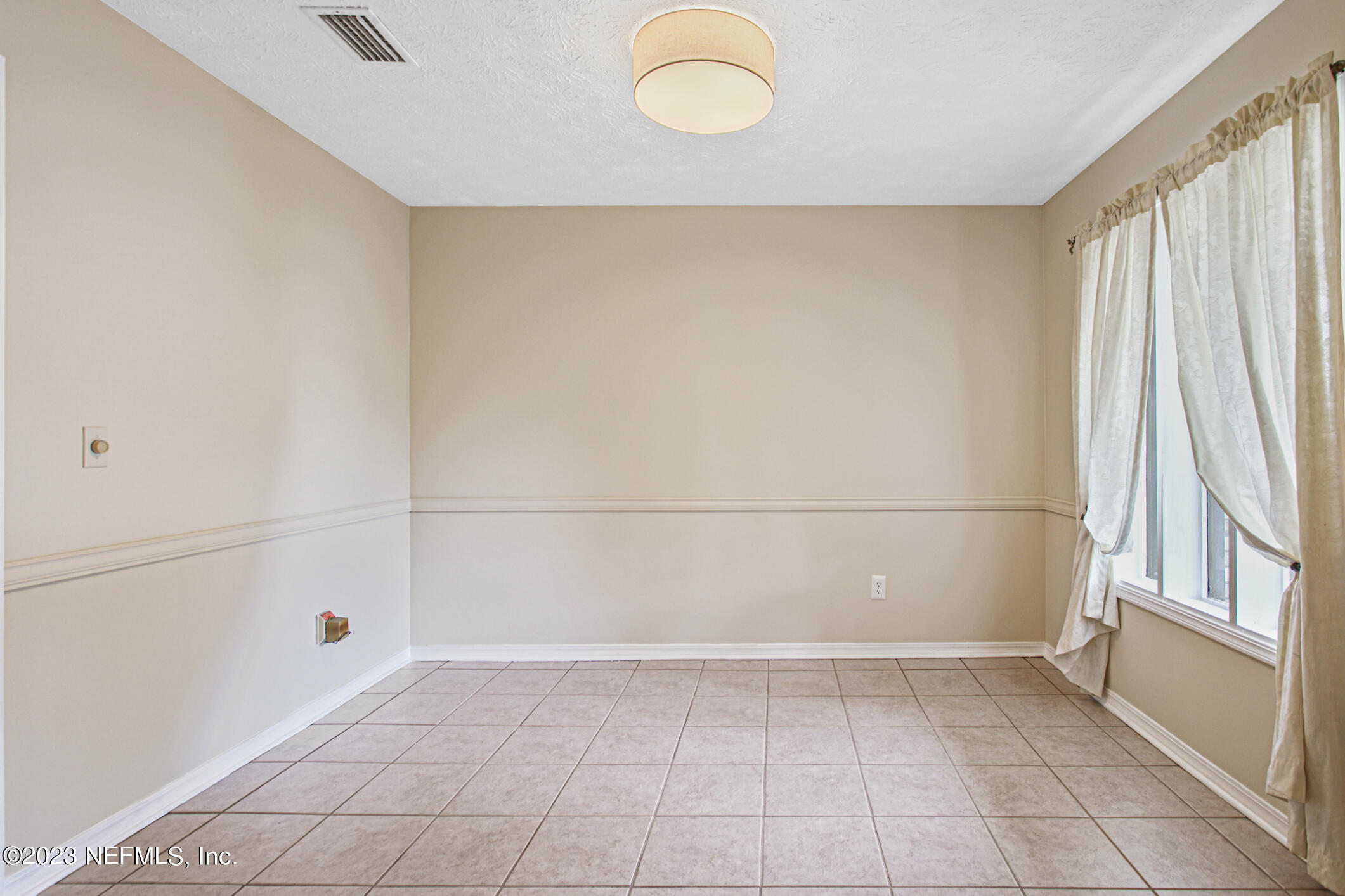 71 Vanderford Road East Orange Park, FL 32073 - Photo 9 of 52 a view of a room with white walls