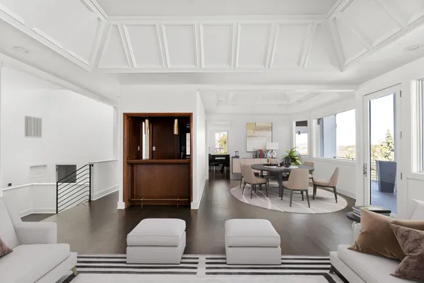 a living room with furniture and window