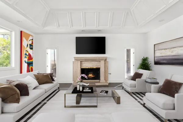 a living room with furniture or couch and a fireplace