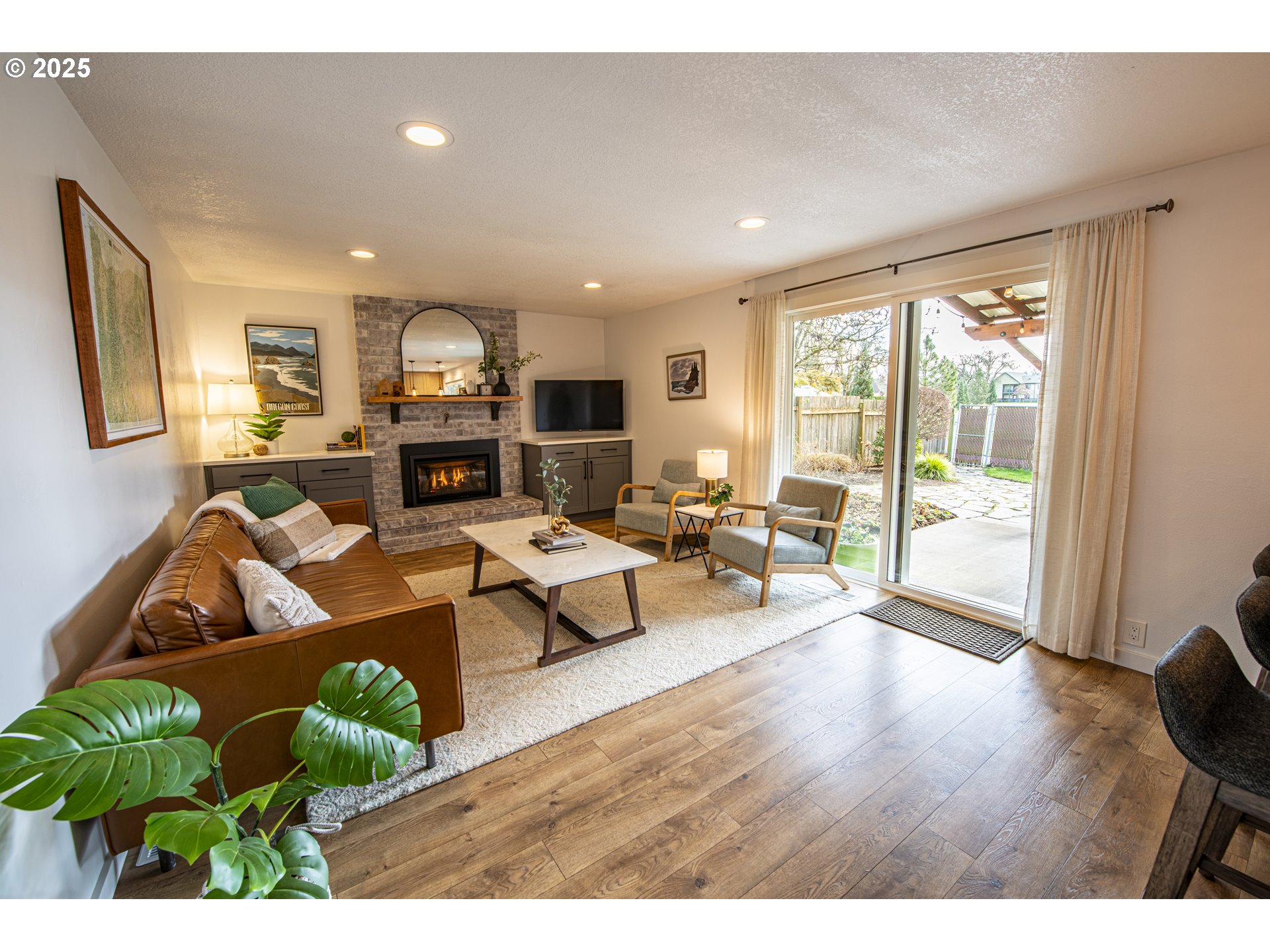 3052 Kentwood Drive Eugene, OR 97401 - Photo 14 of 43 a living room with furniture and a large window