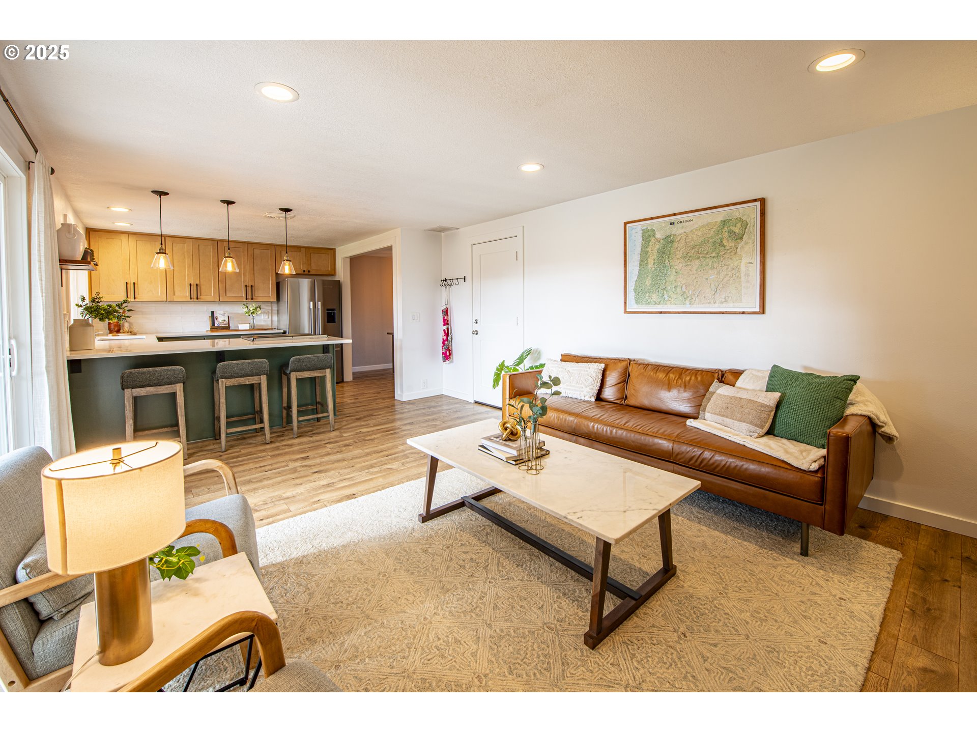 3052 Kentwood Drive Eugene, OR 97401 - Photo 18 of 43 a living room with furniture and kitchen view