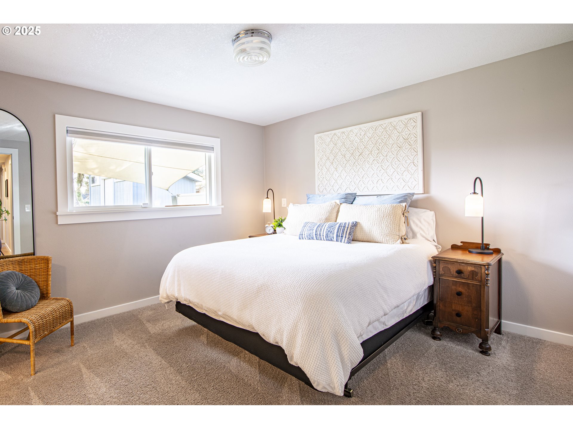 3052 Kentwood Drive Eugene, OR 97401 - Photo 26 of 43 a bedroom with a bed and window