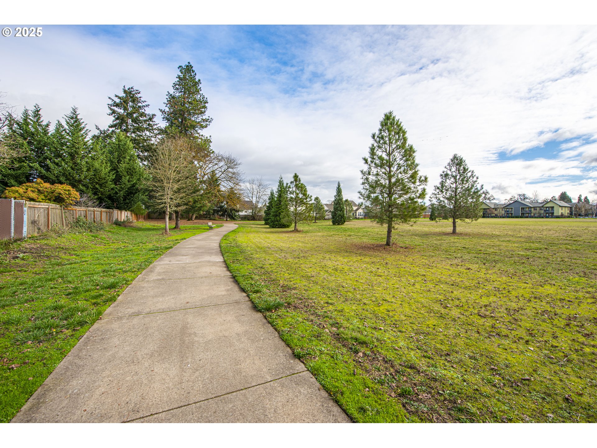 3052 Kentwood Drive Eugene, OR 97401 - Photo 42 of 43 a view of a golf course with a lake