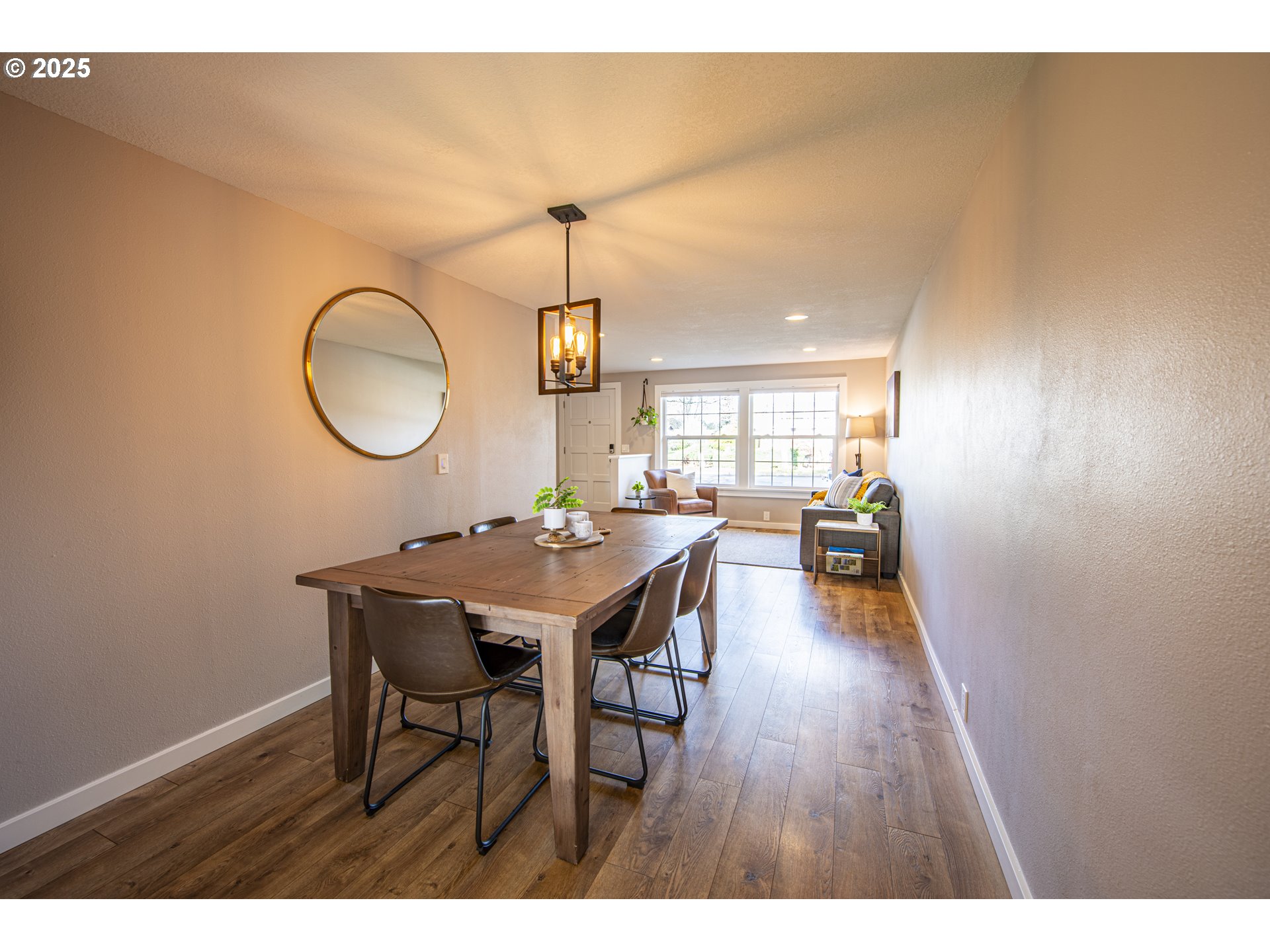 3052 Kentwood Drive Eugene, OR 97401 - Photo 8 of 43 a view of a dining room with furniture and wooden floor