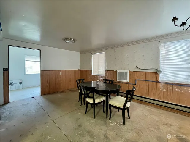 a view of a dining room with furniture