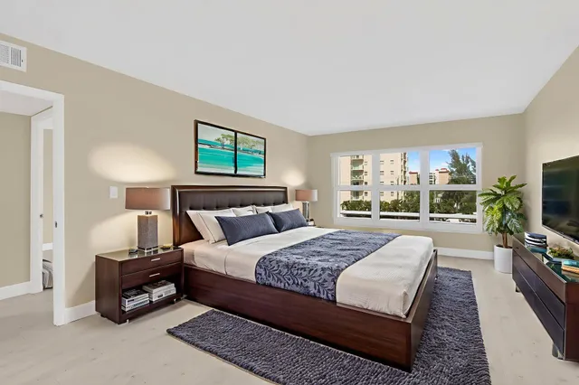 a view of a balcony with a potted plant