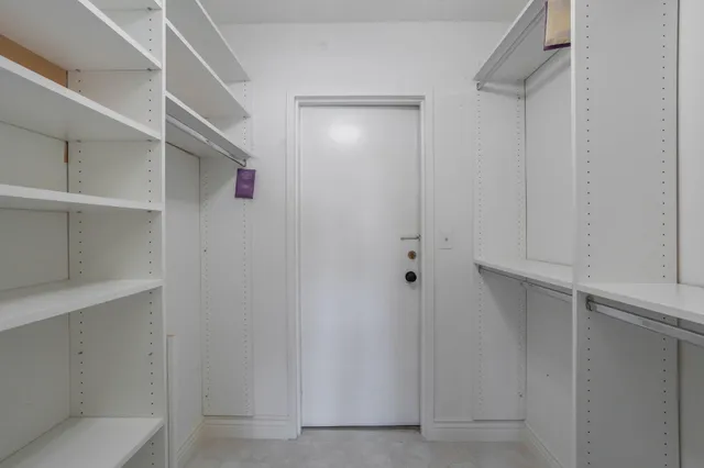 a room with furniture pool table and a rug