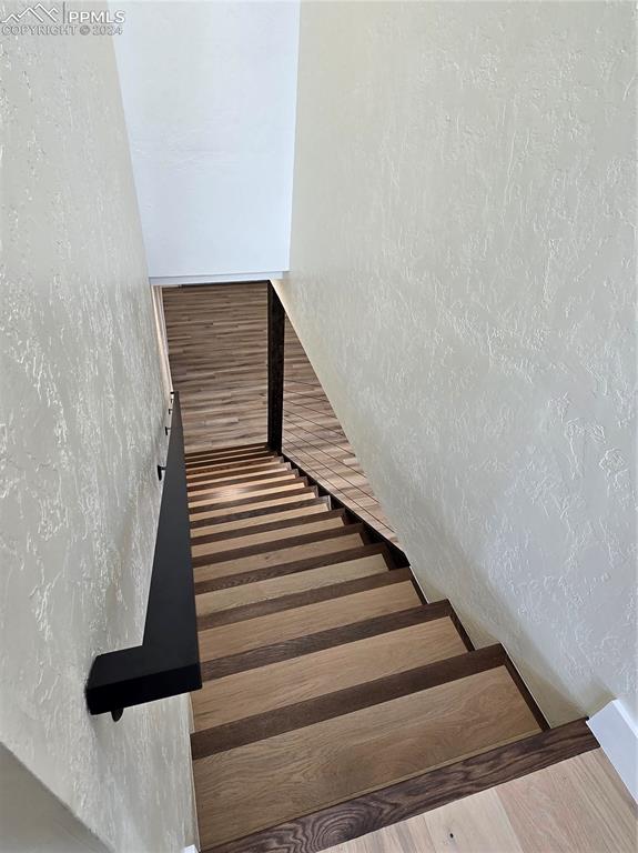 33036 Meadow Ridge Lane Trinidad, CO 81082 - Photo 38 of 50 Stairs with hardwood / wood-style flooring