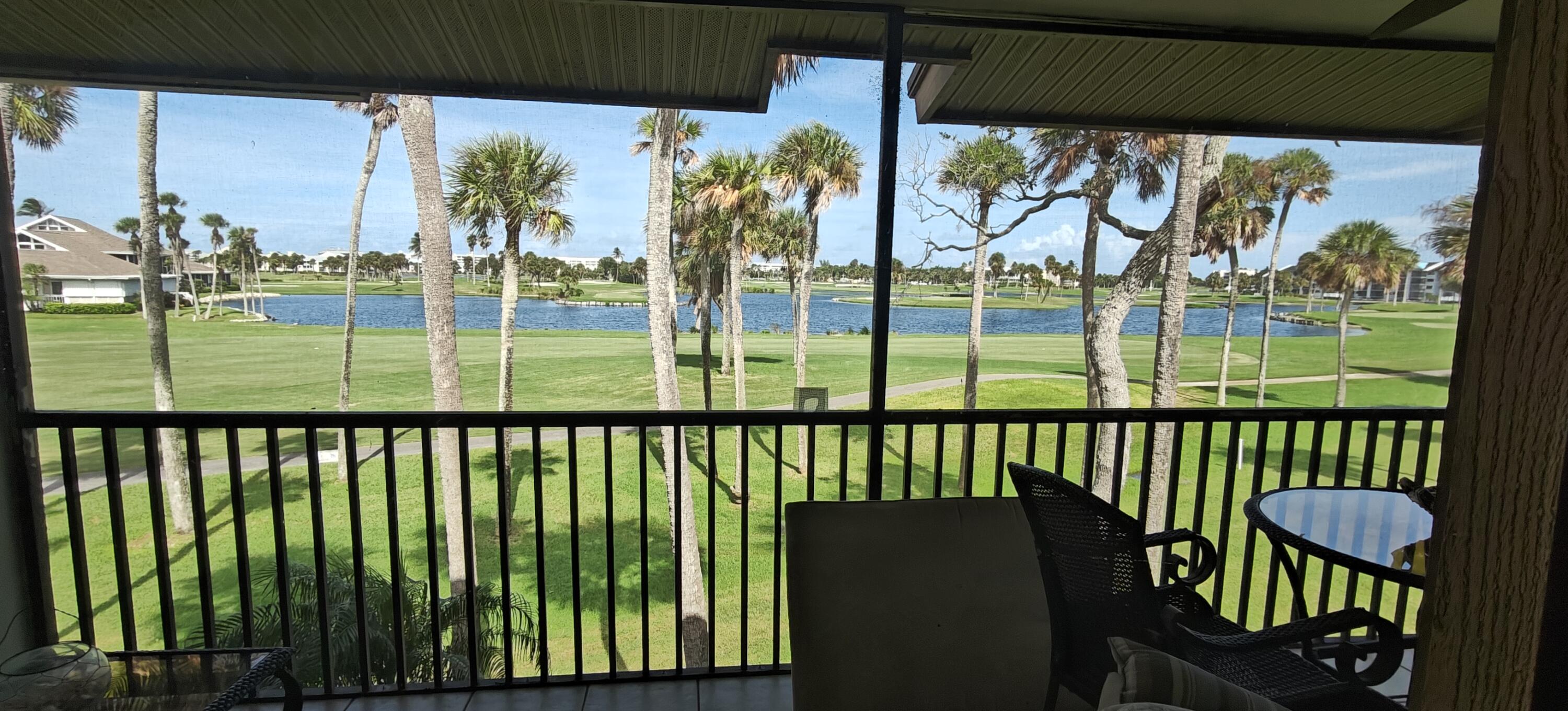 233 Northeast Edgewater Drive, Unit 203 Stuart, FL 34996 - Photo 24 of 30 a view of a chair in the roof deck