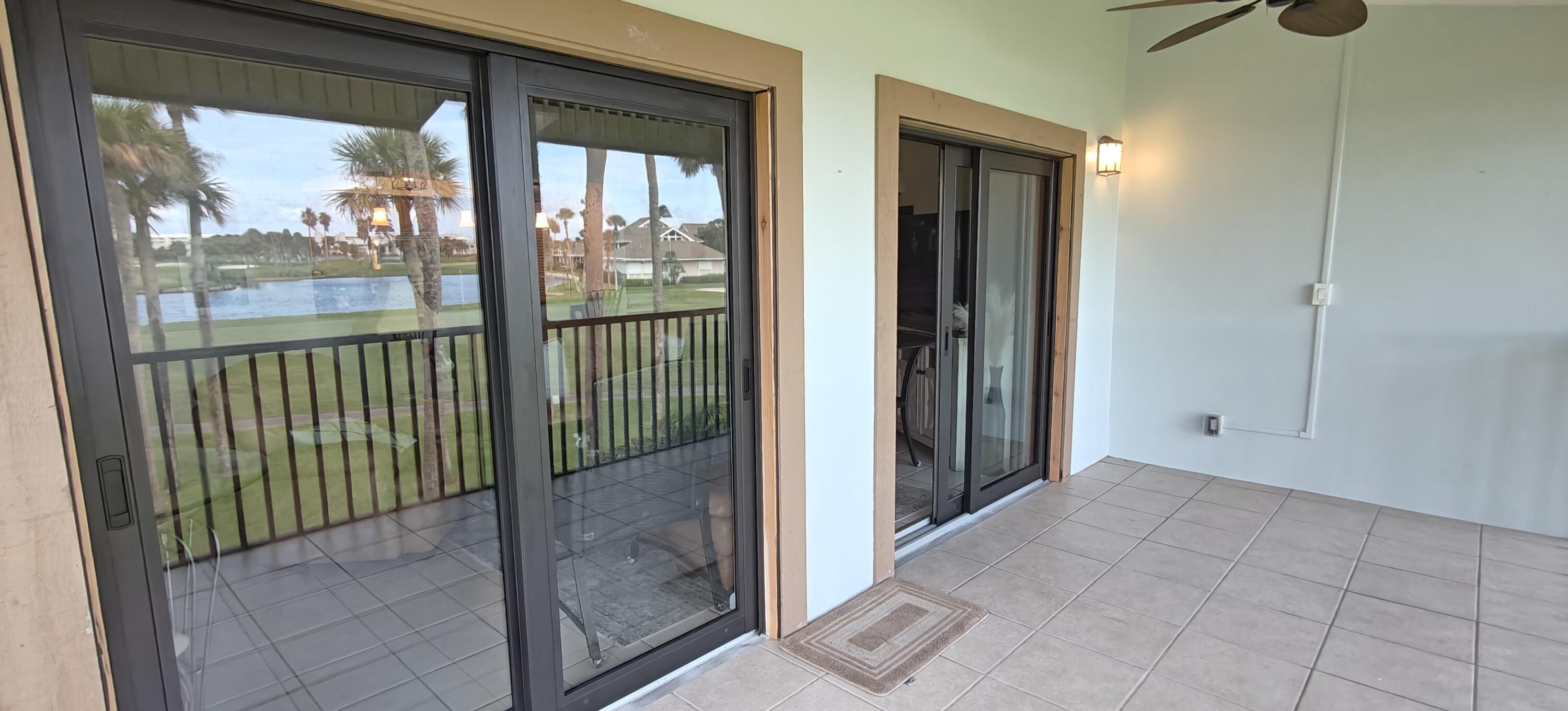 233 Northeast Edgewater Drive, Unit 203 Stuart, FL 34996 - Photo 26 of 30 a view of a balcony from window