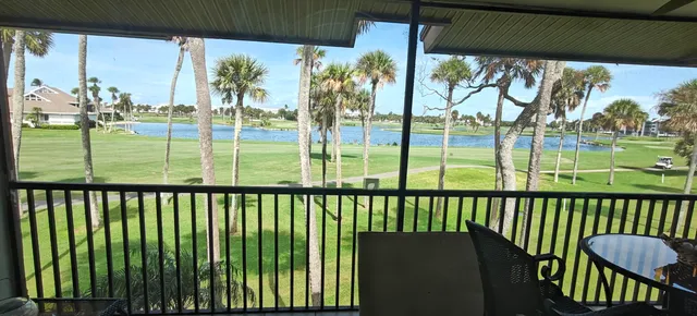 a view of a porch with a yard