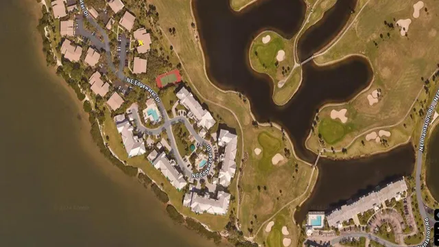 an aerial view of a highlighted house