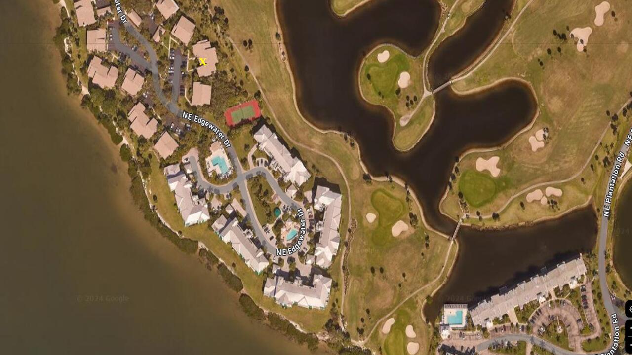 233 Northeast Edgewater Drive, Unit 203 Stuart, FL 34996 - Photo 30 of 30 an aerial view of a highlighted house