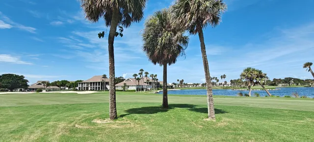 a view of a park with swings