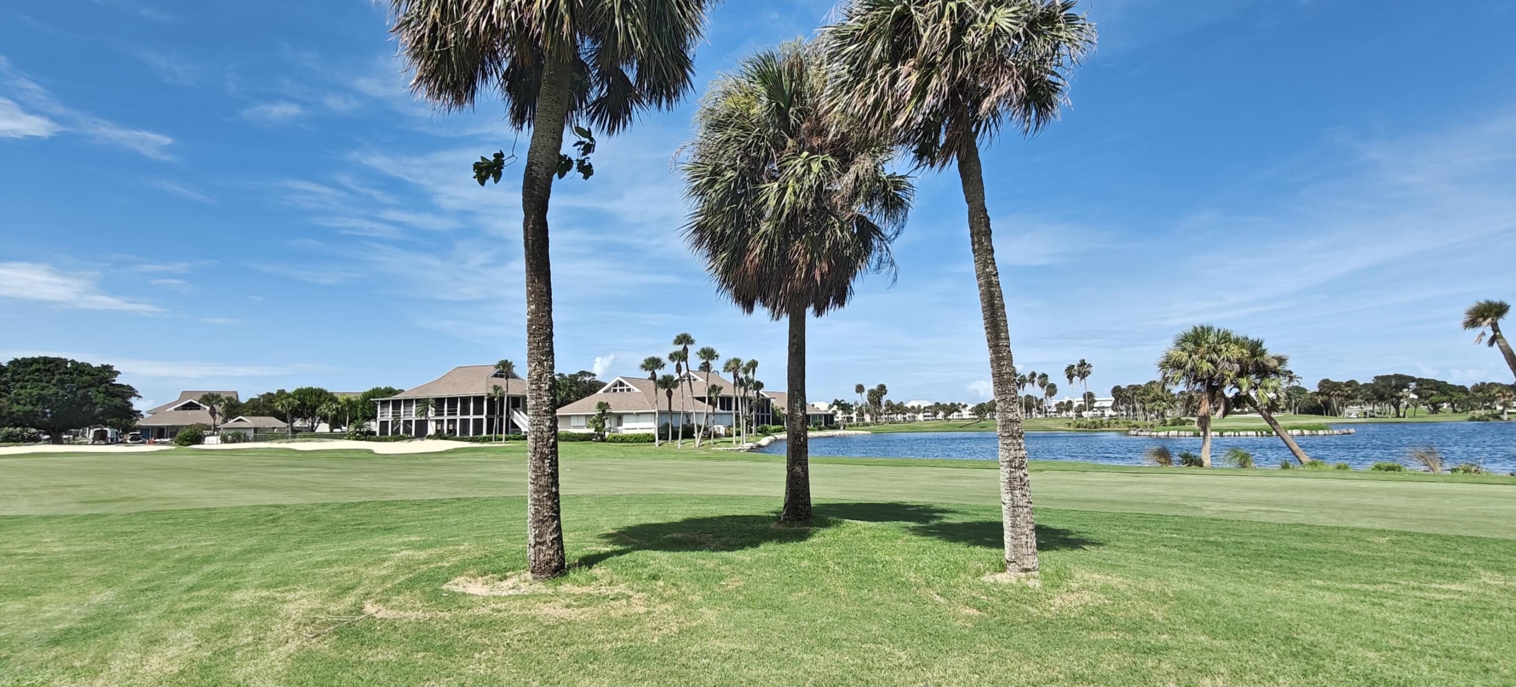 233 Northeast Edgewater Drive, Unit 203 Stuart, FL 34996 - Photo 6 of 30 a view of a park with swings