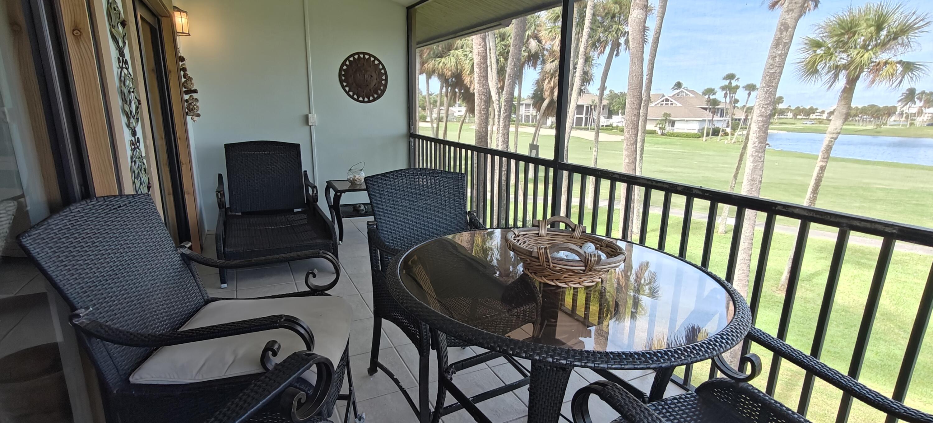 233 Northeast Edgewater Drive, Unit 203 Stuart, FL 34996 - Photo 7 of 30 a view of a dining room with furniture window and outside view