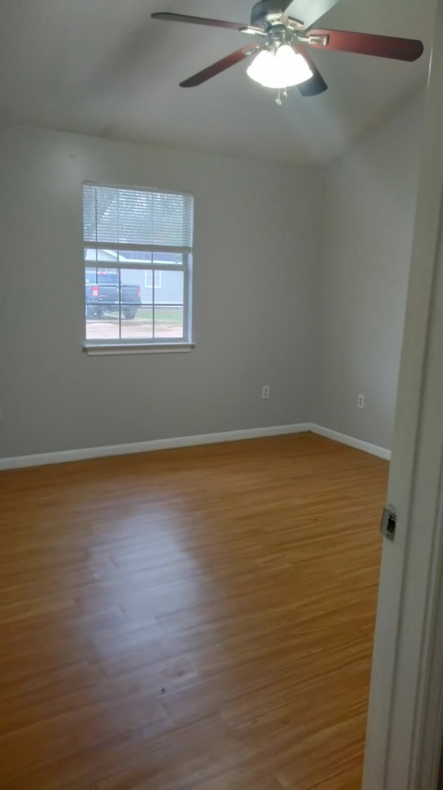 40 Sunset Ridge Drive Coldspring, TX 77331 - Photo 3 of 12 a view of an empty room with a window