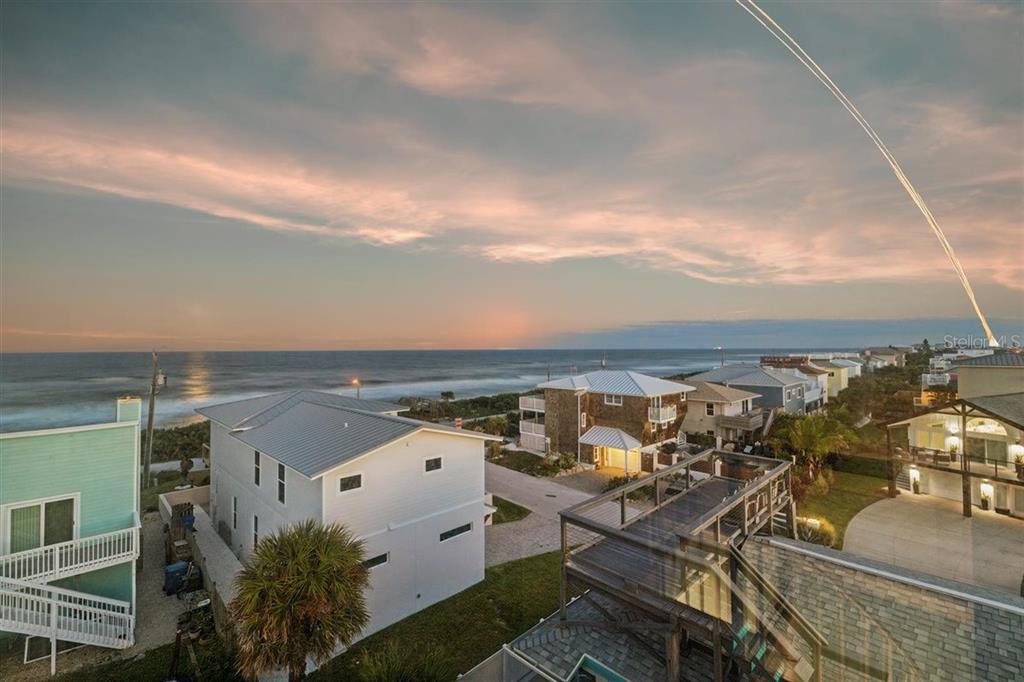 6191 Turtlemound Road New Smyrna Beach, FL 32169 - Photo 58 of 90 an aerial view of a city