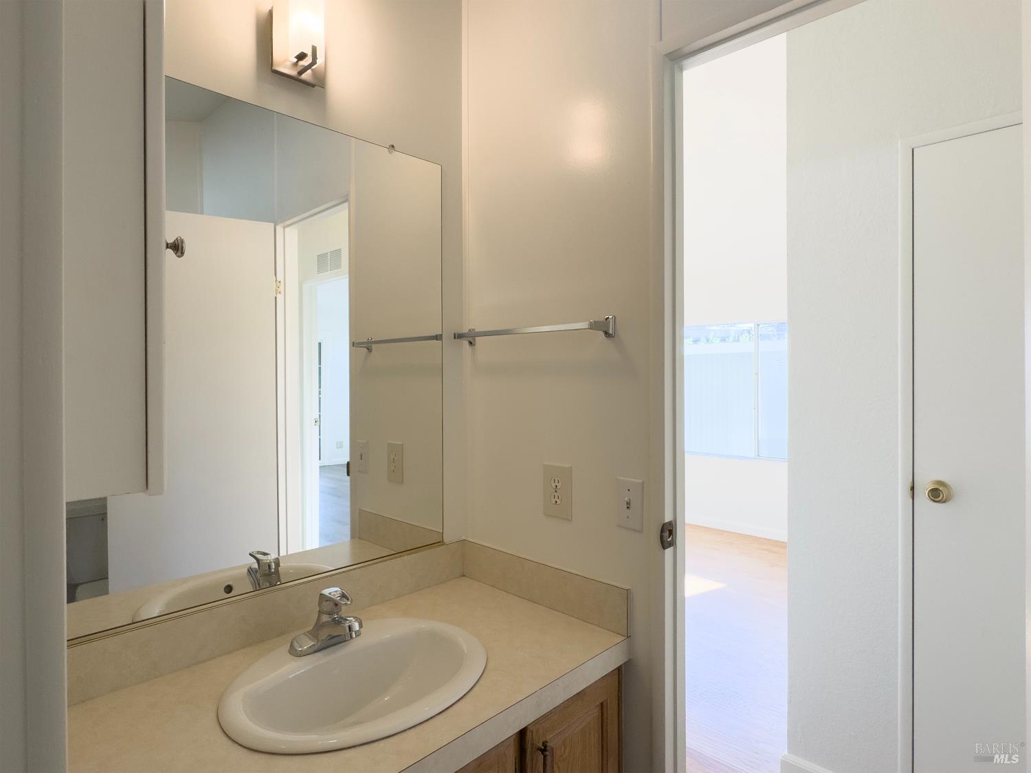 49 Ramon Street Sonoma, CA 95476 - Photo 17 of 39 a bathroom with a sink and a mirror