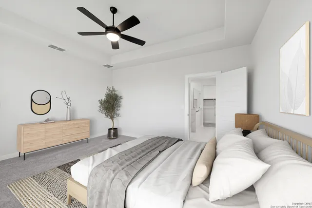 a bedroom with a bed and window