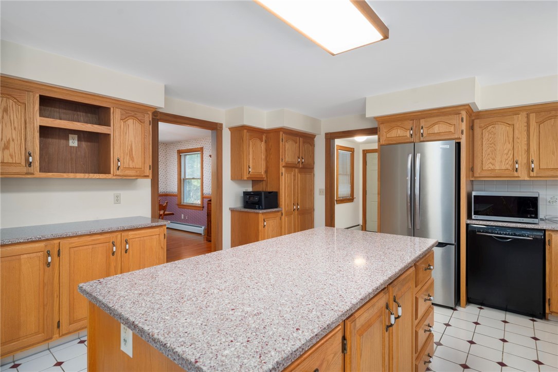310 Plain Road West Greenwich, RI 02817 - Photo 17 of 39 Kitchen with view into the dining room