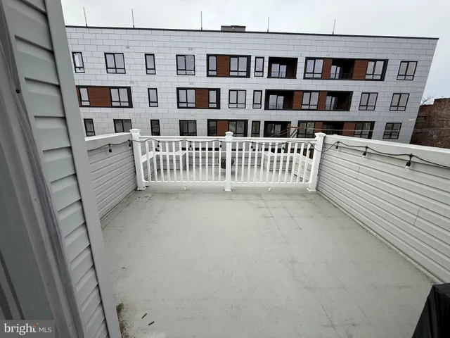 a view of a bedroom with a book shelf