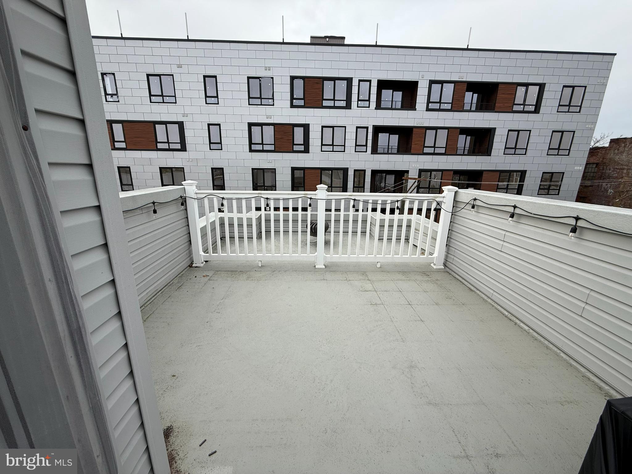 2131 North 10th Street Philadelphia, PA 19122 - Photo 18 of 18 a view of a bedroom with a book shelf
