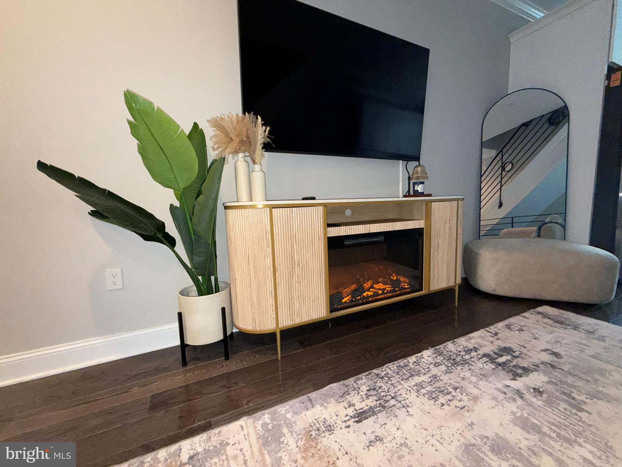 2131 North 10th Street Philadelphia, PA 19122 - Photo 3 of 18 a living room with furniture and a fireplace