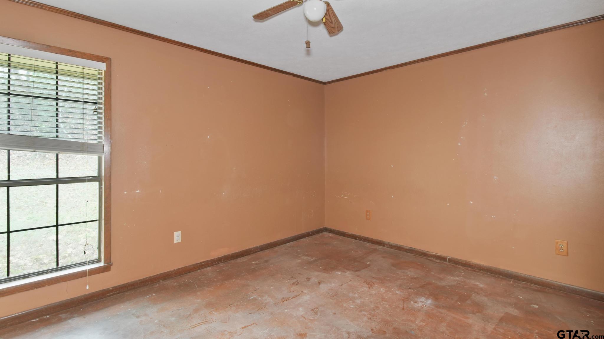 130 Golfcrest Drive Rusk, TX 75785 - Photo 11 of 23 an empty room with a window