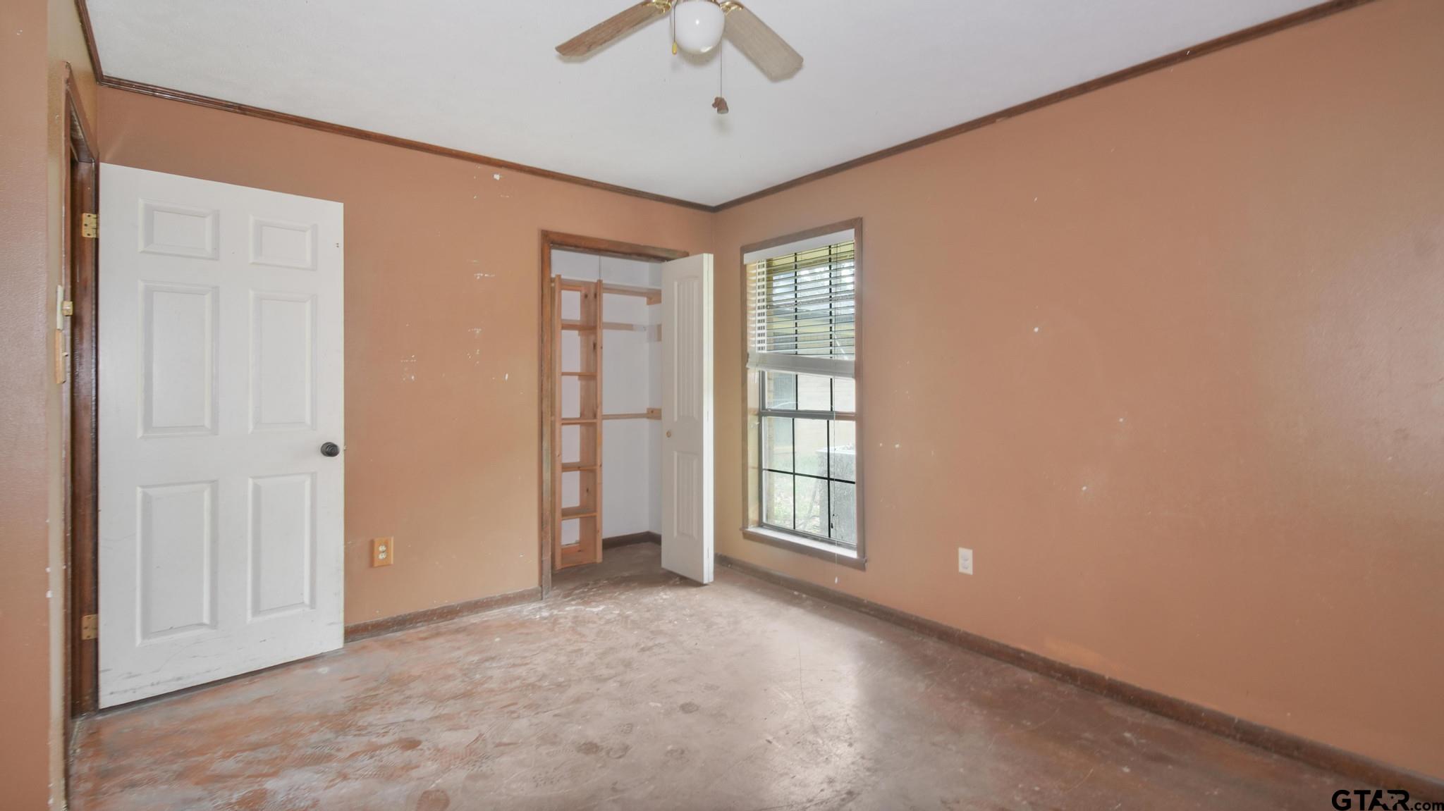130 Golfcrest Drive Rusk, TX 75785 - Photo 12 of 23 an empty room with windows and closet
