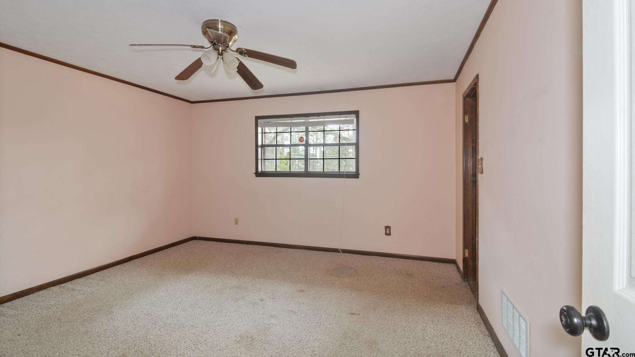 130 Golfcrest Drive Rusk, TX 75785 - Photo 13 of 23 a view of empty room with ceiling fan