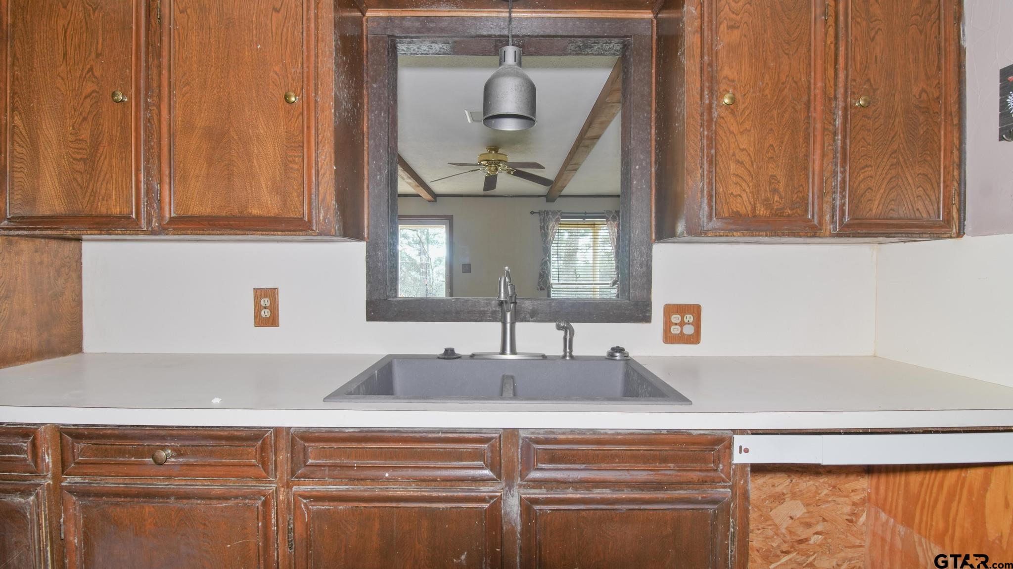130 Golfcrest Drive Rusk, TX 75785 - Photo 21 of 23 a close view of sink and tap